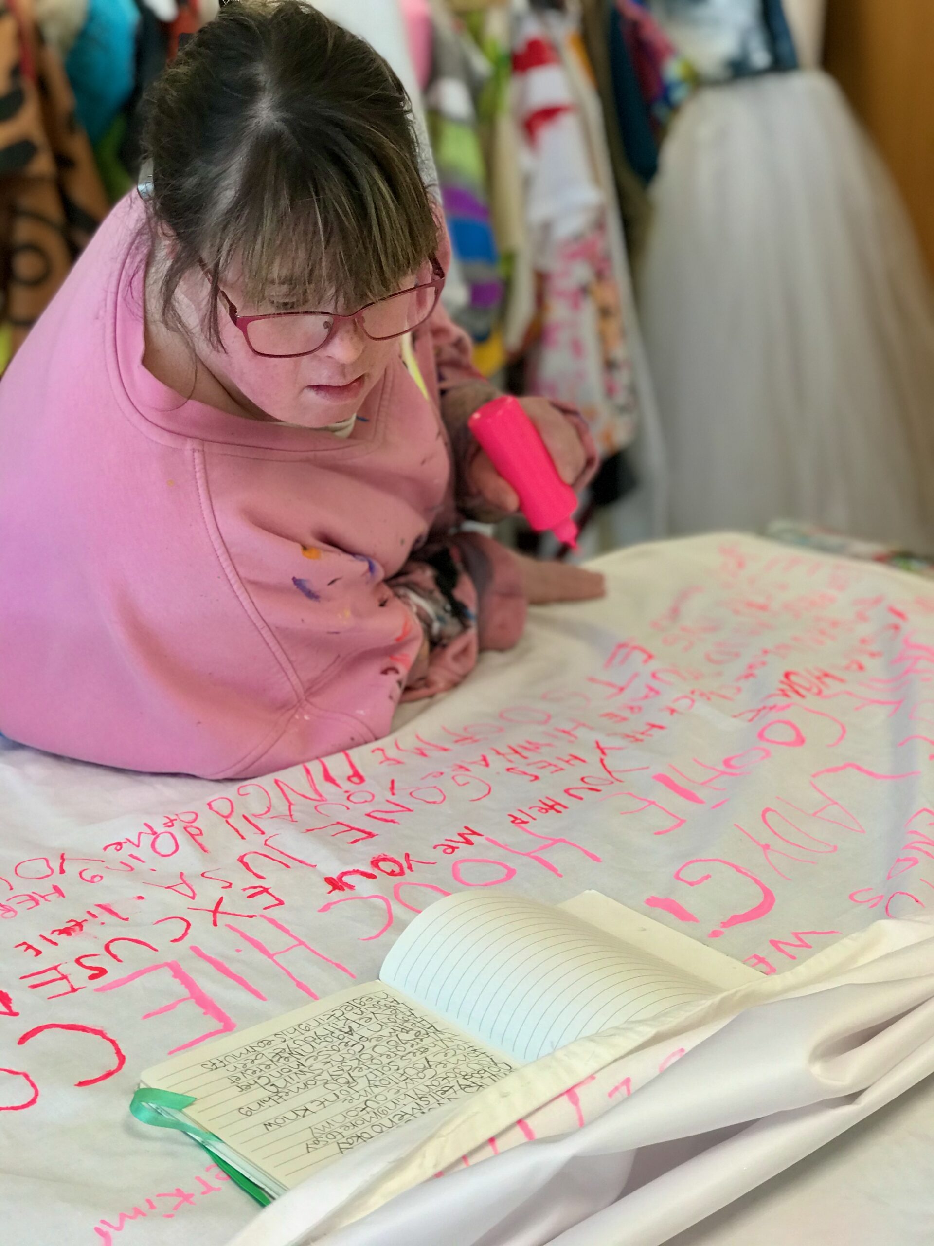 A girl creating a wedding dress.